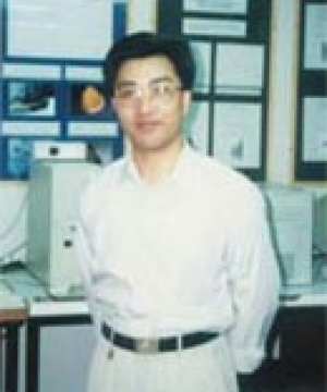 何玉明  